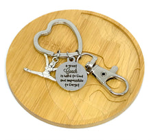 Load image into Gallery viewer, "A great Coach is hard to find and impossible to forget" Keychain