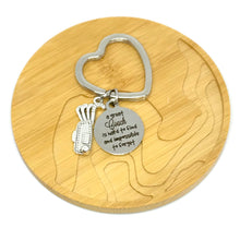 Load image into Gallery viewer, "A great Coach is hard to find and impossible to forget" Keychain