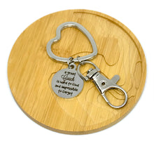 Load image into Gallery viewer, "A great Coach is hard to find and impossible to forget" Keychain