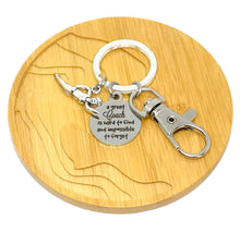 Load image into Gallery viewer, "A great Coach is hard to find and impossible to forget" Keychain