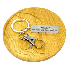 Load image into Gallery viewer, &quot;Drive Safe. We need you here with us.&quot; Keychain