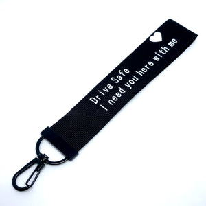 "Drive Safe. I need you here with me." Clip Keychain